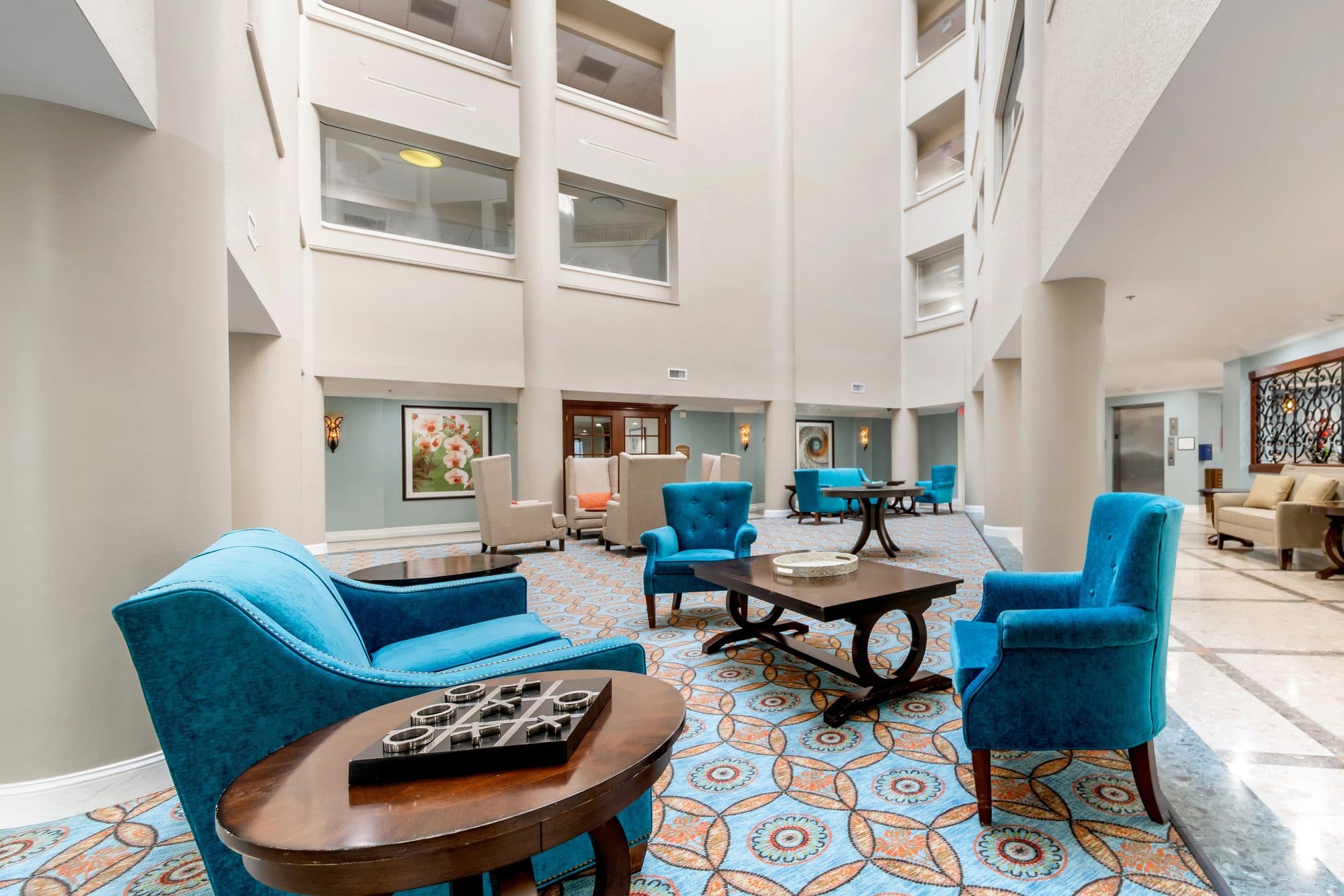 Lobby atrium lounge with armchairs